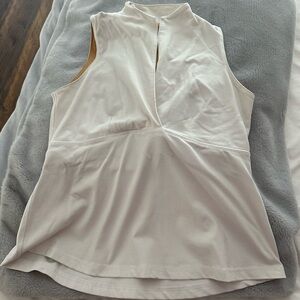 Lululemon tank top size 14. White/Cream colour